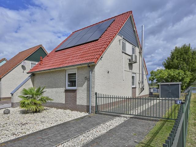 Außenseite Ferienhaus [Sommer]